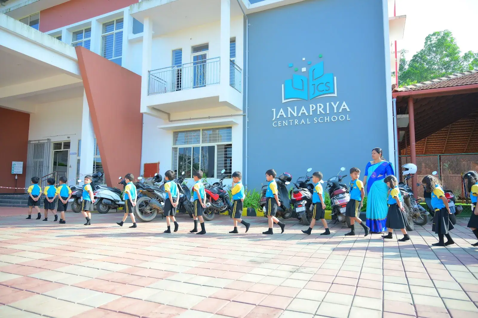 Students at the Janapriya Central School entrance, Kambalabettu, Vittal